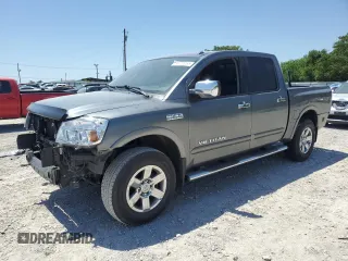 2015 Nissan Titan Pro-4X with VIN 1N6BA0EC5FN514184, listed as a Copart auction lot 56721065 with 127,283 mi miles and Salvage title. Bid and sale history available at DreamBid. Image 1.