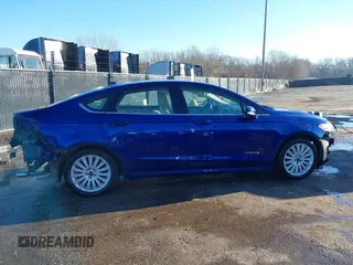2016 Ford Fusion SE Hybrid with VIN 3FA6P0LU0GR388187, listed as a IAAI auction lot 38604646 with 135,625 mi miles. Bid and sale history available at carsss.com. Image 14.
