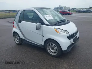 2013 Smart fortwo Pure с VIN WMEEJ3BA8DK702895, выставлен на аукционе IAAI как лот 42779426 с пробегом 13 927 миль миль и . История ставок и продаж доступна на DreamBid. Изображение 1.