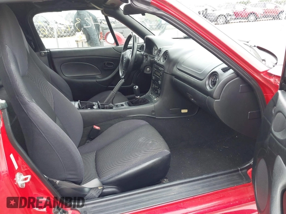 2002 Mazda MX-5 Miata Cloth with VIN JM1NB353220229173, listed as a IAAI auction lot 42344106 with 153,242 mi miles and . Bid and sale history available at DreamBid. Image 5.