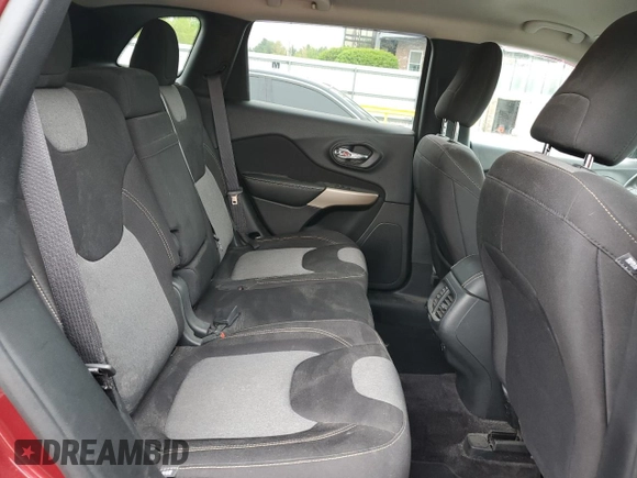 2018 Jeep Cherokee Latitude z VIN 1C4PJMCB6JD610141, wystawiony jako Copart lot #55257945 z przebiegiem 154 215 mil mil oraz Szkoda całkowita • Salvage title. Historia ofert i sprzedaży dostępna na DreamBid. Obrazek 11.