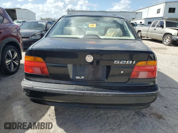 2000 BMW 5 Series 528iA with VIN WBADM6340YGU16735, listed as a Copart auction lot 77249644 with 0 mi miles and Salvage Title. Bid and sale history available at carsss.com. Image 6.
