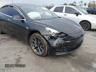 2019 Tesla Model 3 Mid Range with VIN 5YJ3E1EA6KF361808, listed as a IAAI auction lot 41767241 with 96,200 mi miles and . Bid and sale history available at carsss.com. Image 6.