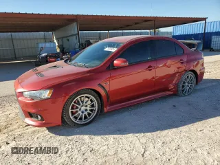 2015 Mitsubishi Lancer Evolution GSR with VIN JA32W8FV5FU014212, listed as a Copart auction lot 71929824 with 81,789 mi miles and Salvage Title. Bid and sale history available at carsss.com. Image 1.