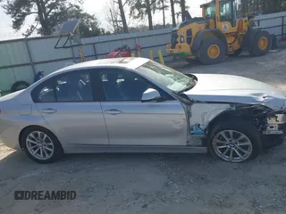 2018 BMW 3 Series 320i with VIN WBA8A9C55JAH14990, listed as a IAAI auction lot 41719896 with 77,472 mi miles. Bid and sale history available at carsss.com. Image 13.