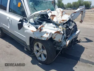 2014 Jeep Patriot Latitude with VIN 1C4NJRFB4ED549734, listed as a IAAI auction lot 42543649 with Not provided miles and . Bid and sale history available at DreamBid. Image 13.