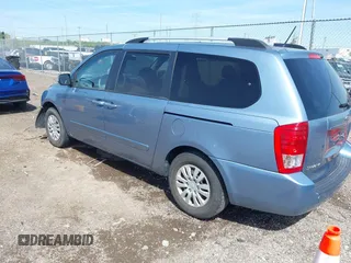 2011 Kia Sedona LX with VIN KNDMG4C74B6368551, listed as a IAAI auction lot 42022483 with 172,495 mi miles. Bid and sale history available at carsss.com. Image 3.