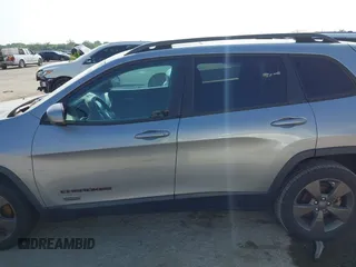 2016 Jeep Cherokee Latitude with VIN 1C4PJLCB7GW256587, listed as a IAAI auction lot 42037539 with 209,267 mi miles. Bid and sale history available at carsss.com. Image 14.