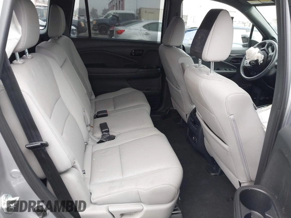 2023 Honda Passport Elite with VIN 5FNYF8H02PB029127, listed as a IAAI auction lot 41166484 with 16,200 mi miles and . Bid and sale history available at DreamBid. Image 8.