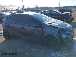 2015 Toyota Prius c One with VIN JTDKDTB36F1113749, listed as a IAAI auction lot 41366238 with 121,610 mi miles. Bid and sale history available at carsss.com. Image 13.