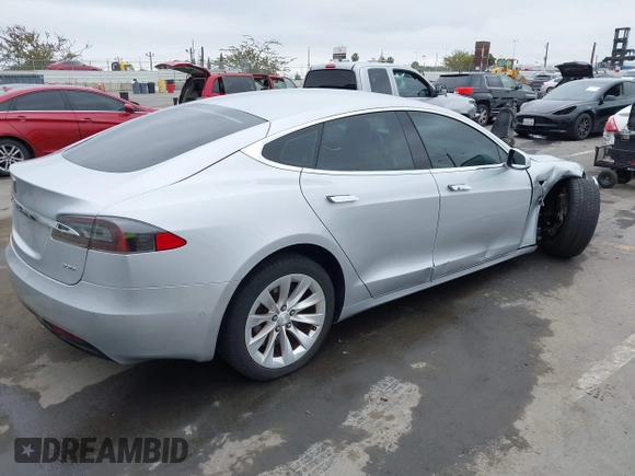 2016 Tesla Model S 90D with VIN 5YJSA1E23GF138925, listed as a IAAI auction lot 42408676 with 48,399 mi miles and . Bid and sale history available at DreamBid. Image 4.