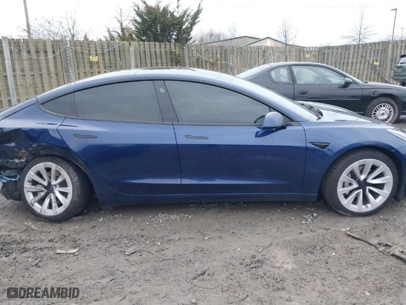 2023 Tesla Model 3 with VIN 5YJ3E1EA7PF446874, listed as a IAAI auction lot 41133303 with 47,748 mi miles. Bid and sale history available at carsss.com. Image 13.