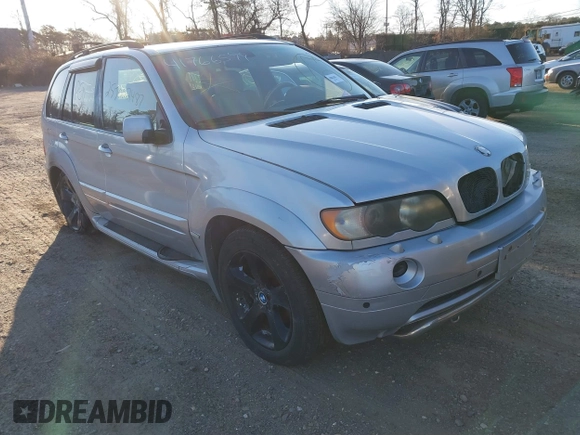2001 BMW X5 4.4i with VIN WBAFB33511LH07282, listed as a IAAI auction lot 41766599 with 999,999 mi miles. Bid and sale history available at carsss.com. Image 1.