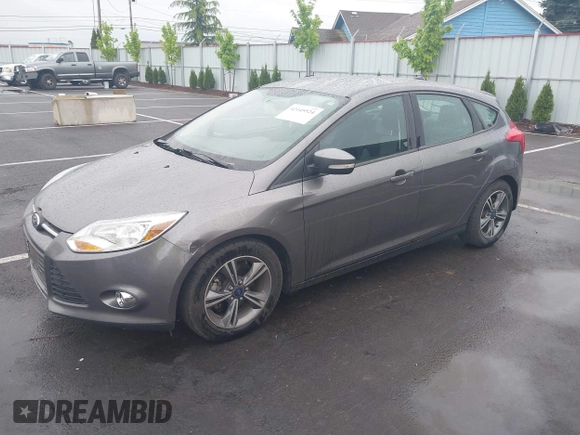 2014 Ford Focus SE with VIN 1FADP3K21EL462169, listed as a IAAI auction lot 42145524 with 100,156 mi miles. Bid and sale history available at carsss.com. Image 2.
