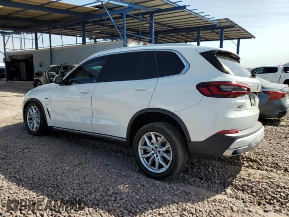 2023 BMW X5 xDrive45e z VIN 5UXTA6C02P9N98430, wystawiony jako Copart lot #51509085 z przebiegiem 24 093 mil mil oraz Szkoda całkowita • Salvage title. Historia ofert i sprzedaży dostępna na DreamBid. Obrazek 2.