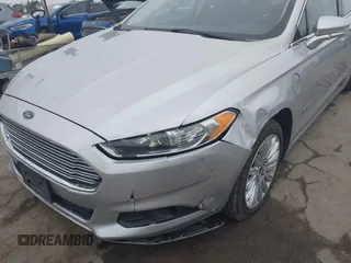 2016 Ford Fusion Energi SE Luxury with VIN 3FA6P0PU9GR357076, listed as a IAAI auction lot 42081615 with 174,234 mi miles. Bid and sale history available at carsss.com. Image 6.