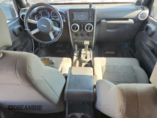 2008 Jeep Wrangler Unlimited Sahara with VIN 1J8GA59158L538460, listed as a Copart auction lot 63897295 with 335,852 mi miles and Clean title. Bid and sale history available at DreamBid. Image 8.