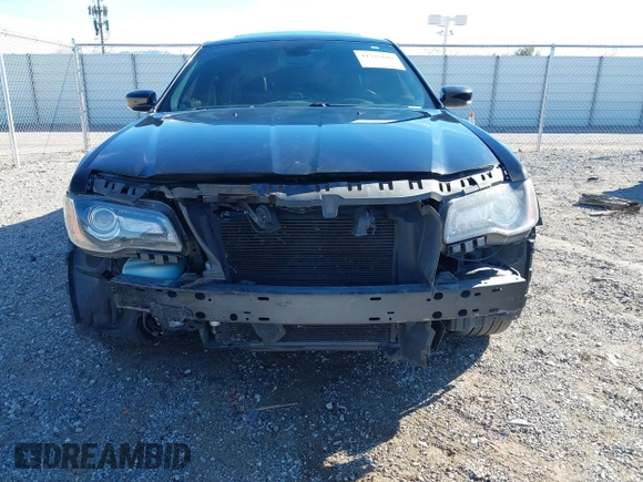 2013 Chrysler 300 with VIN 2C3CCABT2DH600560, listed as a IAAI auction lot 41725688 with 158,397 mi miles. Bid and sale history available at carsss.com. Image 6.