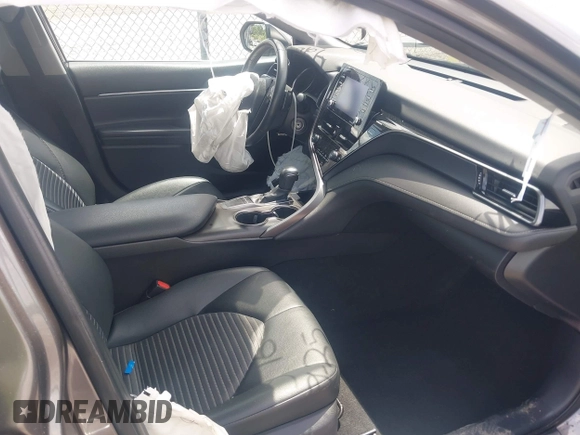 2022 Toyota Camry SE z VIN 4T1G11AK0NU057778, wystawiony jako IAAI lot #42094950 z przebiegiem 115 649 mil mil oraz . Historia ofert i sprzedaży dostępna na DreamBid. Obrazek 5.