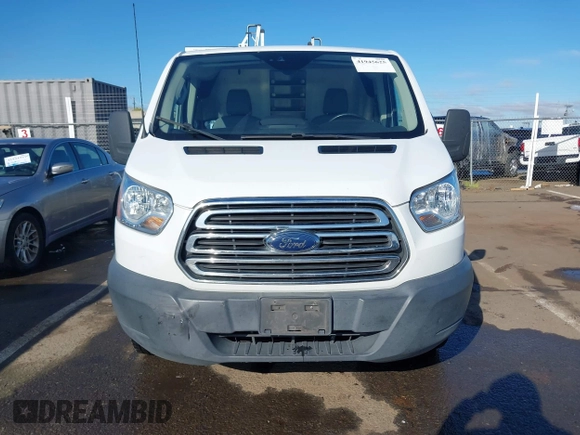 2018 Ford Transit z VIN 1FTYR1YG9JKA61529, wystawiony jako IAAI lot #41945625 z przebiegiem 132 463 mil mil oraz . Historia ofert i sprzedaży dostępna na DreamBid. Obrazek 13.