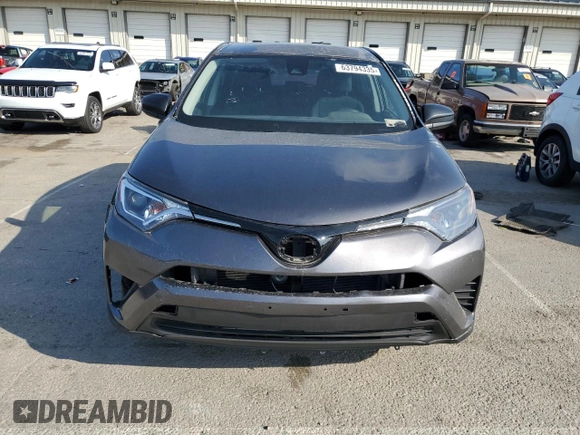 2018 Toyota RAV4 LE with VIN JTMBFREV5JJ736492, listed as a Copart auction lot 63794335 with 97,374 mi miles and Clean title. Bid and sale history available at DreamBid. Image 5.