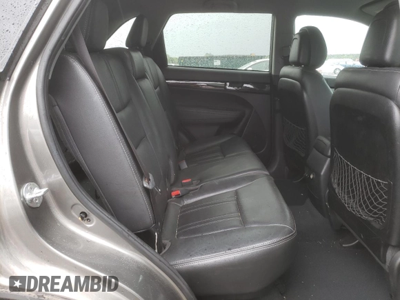 2012 Kia Sorento EX z VIN 5XYKU4A68CG209833, wystawiony jako Copart lot #53942035 z przebiegiem 216 199 mil mil oraz Szkoda całkowita • Salvage title. Historia ofert i sprzedaży dostępna na DreamBid. Obrazek 11.