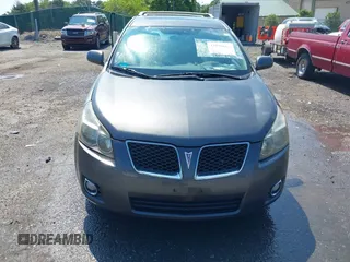 2009 Pontiac Vibe with VIN 5Y2SM67009Z462332, listed as a IAAI auction lot 42620669 with 164,227 mi miles and . Bid and sale history available at DreamBid. Image 6.