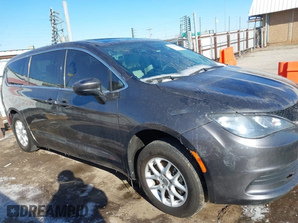 2017 Chrysler Pacifica Touring with VIN 2C4RC1DG7HR648786, listed as a IAAI auction lot 41570029 with 125,406 mi miles and . Bid and sale history available at DreamBid. Image 14.