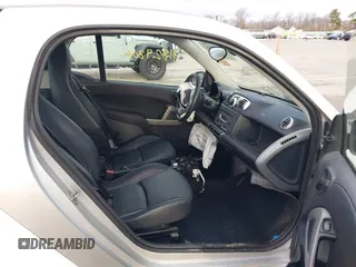 2013 Smart fortwo Pure with VIN WMEEJ3BA2DK702004, listed as a IAAI auction lot 41829808 with 53,545 mi miles and . Bid and sale history available at DreamBid. Image 8.