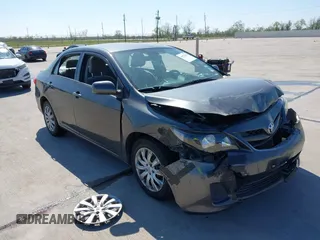 2012 Toyota Corolla L with VIN 2T1BU4EE9CC831743, listed as a IAAI auction lot 41870966 with 166,548 mi miles. Bid and sale history available at carsss.com. Image 1.