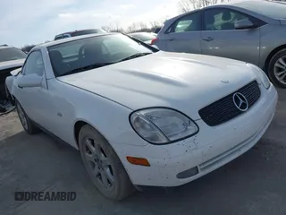 1999 Mercedes-Benz SLK-Class with VIN WDBKK47F4XF128106, listed as a IAAI auction lot 41508431 with 66,885 mi miles. Bid and sale history available at carsss.com. Image 1.