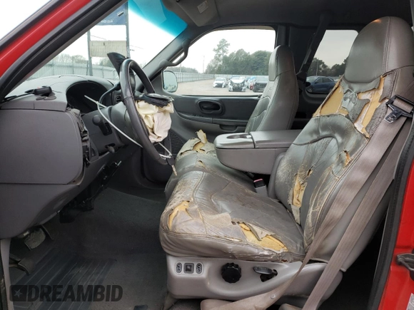 1999 Ford F-150 XL z VIN 2FTRX08L3XCA33434, wystawiony jako Copart lot #88088465 z przebiegiem 252 373 mil mil oraz Szkoda całkowita • Salvage title. Historia ofert i sprzedaży dostępna na DreamBid. Obrazek 7.