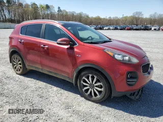 2017 Kia Sportage EX with VIN KNDPNCAC8H7215672, listed as a Copart auction lot 50593845 with 96,665 mi miles and Salvage title. Bid and sale history available at DreamBid. Image 4.