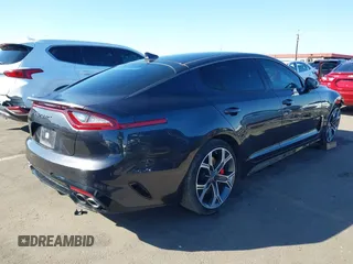 2019 Kia Stinger GT with VIN KNAE35LC3K6059198, listed as a IAAI auction lot 41599686 with 82,886 mi miles. Bid and sale history available at carsss.com. Image 4.