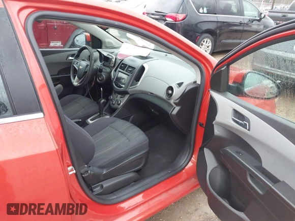 2013 Chevrolet Sonic LT with VIN 1G1JC6SHXD4139822, listed as a IAAI auction lot 41672289 with 87,899 mi miles. Bid and sale history available at carsss.com. Image 5.