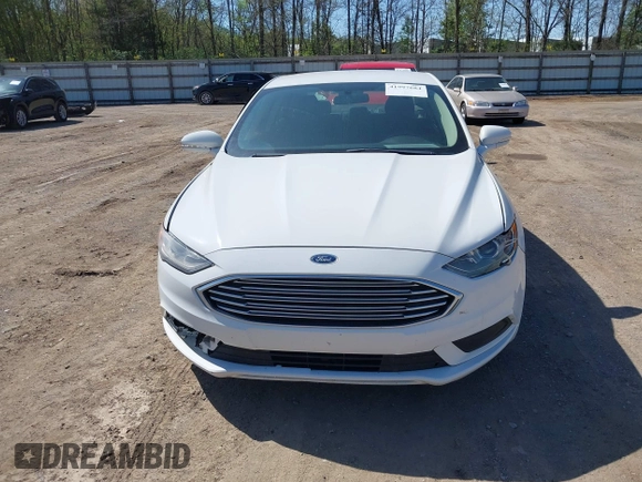 2017 Ford Fusion Hybrid SE z VIN 3FA6P0LU8HR396572, wystawiony jako IAAI lot #41997684 z przebiegiem 272 803 mil mil oraz . Historia ofert i sprzedaży dostępna na DreamBid. Obrazek 12.