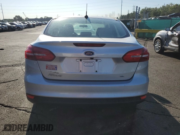 2018 Ford Focus SE z VIN 1FADP3F26JL278091, wystawiony jako Copart lot #63879875 z przebiegiem 81 984 mil mil oraz Czysty tytuł • Clean title. Historia ofert i sprzedaży dostępna na DreamBid. Obrazek 6.