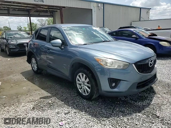 2014 Mazda CX-5 Touring with VIN JM3KE4CYXE0409558, listed as a Copart auction lot 51762995 with 91,082 mi miles and Salvage Title. Bid and sale history available at carsss.com. Image 14.