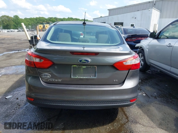 2012 Ford Focus SE z VIN 1FAHP3F22CL125941, wystawiony jako IAAI lot #42176898 z przebiegiem 157 940 mil mil oraz . Historia ofert i sprzedaży dostępna na DreamBid. Obrazek 16.