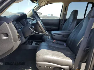 2001 Dodge Dakota Sport z VIN 1B7HG2AN61S316996, wystawiony jako Copart lot #58677535 z przebiegiem 164 628 mil mil oraz Tytuł czysty. Historia ofert i sprzedaży dostępna na DreamBid. Obrazek 7.