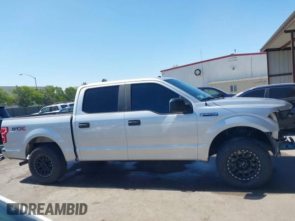 2018 Ford F-150 XL with VIN 1FTEW1CP6JKF36573, listed as a IAAI auction lot 42314415 with 121,240 mi miles and . Bid and sale history available at DreamBid. Image 14.