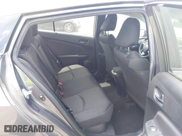 2021 Toyota Prius L Eco z VIN JTDKAMFU3M3152785, wystawiony jako IAAI lot #42501351 z przebiegiem 60 489 mil mil oraz . Historia ofert i sprzedaży dostępna na DreamBid. Obrazek 8.
