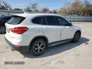 2019 BMW X1 sDrive28i with VIN WBXHU7C52K3H44195, listed as a Copart auction lot 42304175 with 88,929 mi miles and Salvage Title. Bid and sale history available at carsss.com. Image 3.
