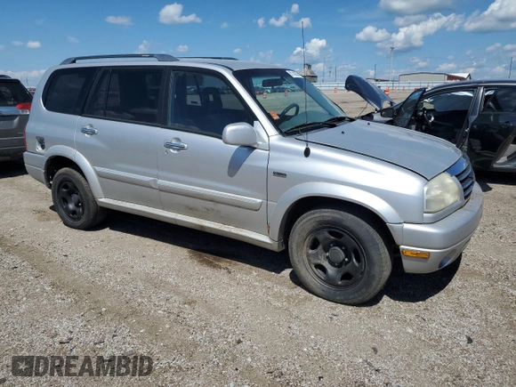 2002 Suzuki XL7 Standard z VIN JS3TX92V224107201, wystawiony jako Copart lot #61142394 z przebiegiem Nie podano mil oraz Szkoda całkowita • Salvage title. Historia ofert i sprzedaży dostępna na DreamBid. Obrazek 4.