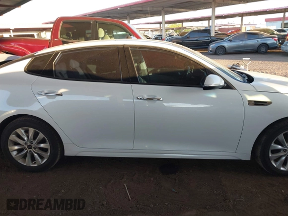2016 Kia Optima EX with VIN 5XXGU4L30GG117411, listed as a IAAI auction lot 42034988 with 123,387 mi miles. Bid and sale history available at carsss.com. Image 13.