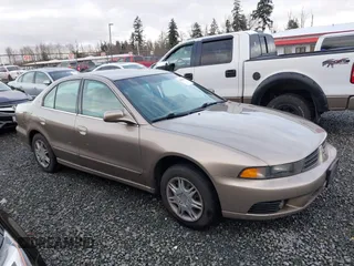 2002 Mitsubishi Galant ES with VIN 4A3AA46G42E142612, listed as a IAAI auction lot 41493433 with 106,960 mi miles. Bid and sale history available at carsss.com. Image 13.
