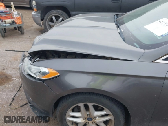 2014 Ford Fusion SE with VIN 1FA6P0HD4E5387312, listed as a IAAI auction lot 41735859 with 152,805 mi miles and . Bid and sale history available at DreamBid. Image 6.
