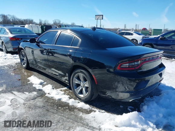 2015 Dodge Charger SXT with VIN 2C3CDXHG5FH841090, listed as a IAAI auction lot 41293591 with 107,732 mi miles and . Bid and sale history available at DreamBid. Image 3.