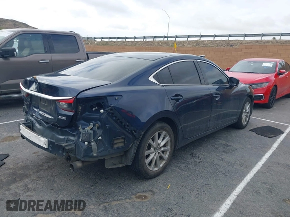 2017 Mazda 6 Sport with VIN JM1GL1U51H1156104, listed as a IAAI auction lot 41769388 with 121,405 mi miles and . Bid and sale history available at DreamBid. Image 4.