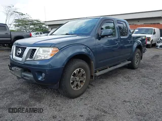 2014 Nissan Frontier SV with VIN 1N6AD0EV1EN755257, listed as a IAAI auction lot 42269702 with 62,451 mi miles and . Bid and sale history available at DreamBid. Image 2.
